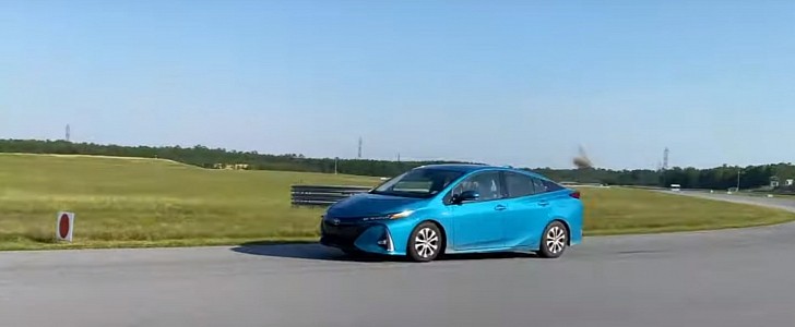Toyota Prius Prime on a racetrack