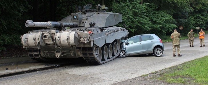 Tank drives over Toyota Yaris