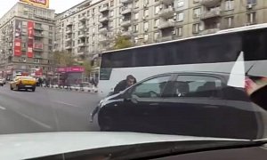 Traffic Incident in Romania Gives a Whole New Meaning to "Hitching a Ride"