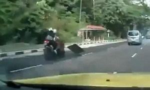 Trash On the Road Causes Very Bad Motorcycle Crash