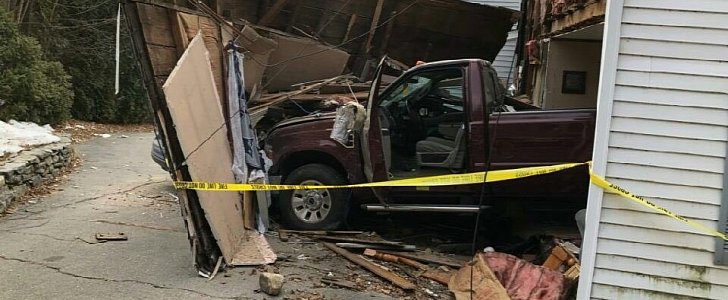 Ford pickup crashes into house, misses sleeping woman by inches