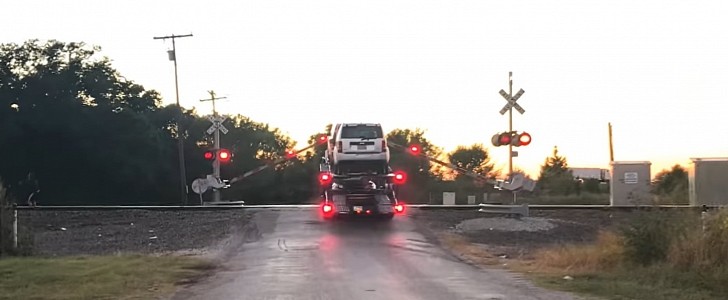 The truck was stuck on the railroad crossing