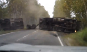 Truck Flips Over, Narrowly Missing the Car