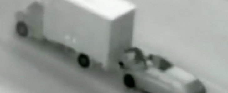 Truck pirates approach moving truck to steal the load