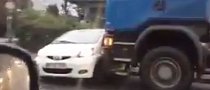 Truck Pushes Toyota Aygo Sideways Along the Road Without Giving a Damn