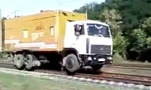 Truck Thinks It's a Train in Russia