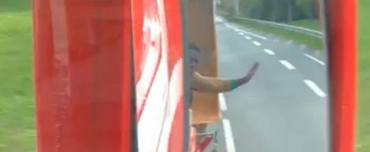 Illegal tries to flag HGV driver down, begging him to pull over