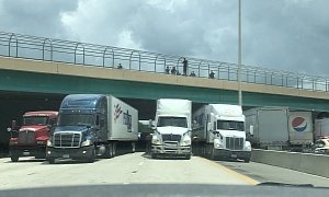 Truckers Park Under Overpass to Prevent Jumper From Killing Himself