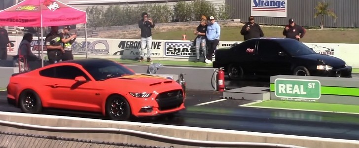 Ford Mustang GT vs. Honda Civic drag race