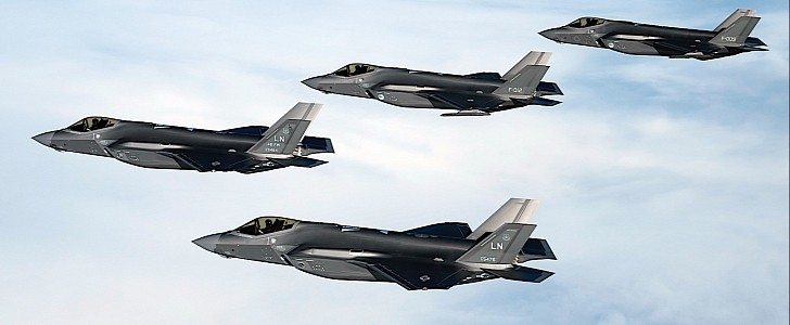 Two American and two Dutch F-35s flying together