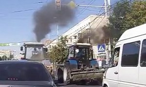 Two Tractors Street Race from a Traffic Light in Russia, Smoke Engulfs Traffic