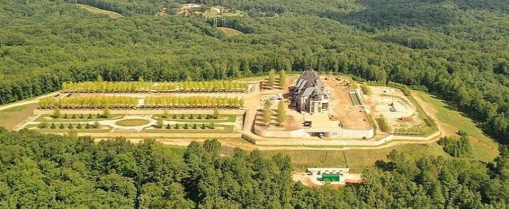 Aerial view of Tyler Perry's Atlanta mansion, with private jet hangar and its own airstrip