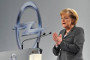 UK Complains About Merkel's State Aid for Opel