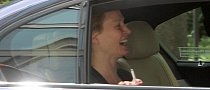 Uma Thurman Looks Happy to Ride in BMW 7 Series