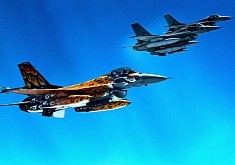 Unique Pic Shows Jaguar-Tattooed F-16 Fighter Jet Escorting B-52 Stratofortress