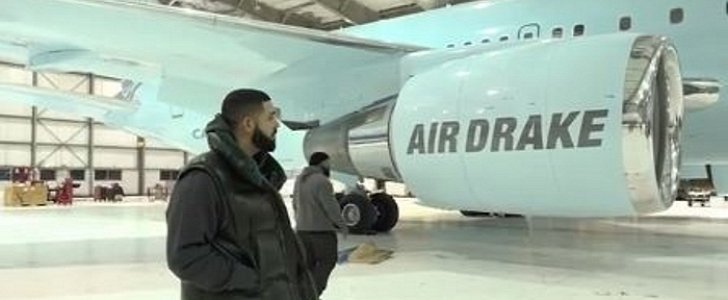 Drake poses in front of his private cargo jet, "Air Drake"
