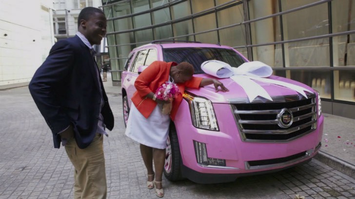 Teddy Bridgewater and Rose Murphy next to the first pink 2015 Cadillac Escalade