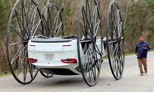 Upside Down Tesla on Stagecoach Wheels Proves How Electricity Beats Gasoline
