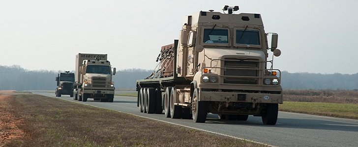US Army Trucks on road