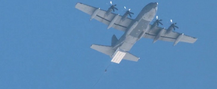 MC-130J aircraft drops a JASSM deployment box, at Emerald Warrior