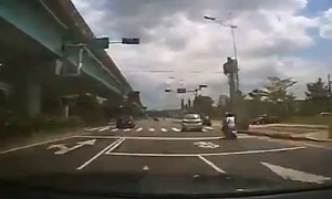 Utterly Stupid Scooter Rider Causes Massive Crash