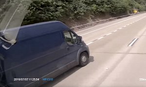 Van Driver Sees Nothing Wrong in Using a Laptop while Driving on a Highway