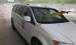 Van Passenger Impaled by Tripod Thrown From Overpass, Survives