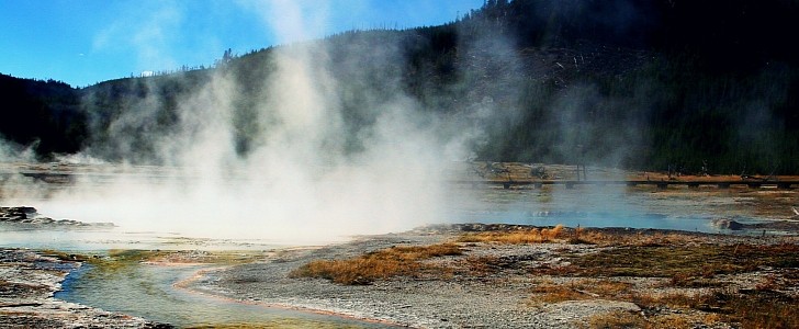 Body of water and steam meant to illustrate geothermal energy