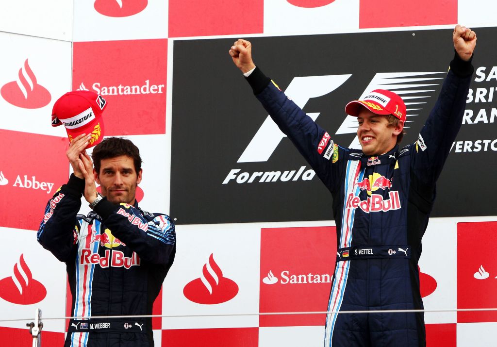 RBR duo Sebastian Vettel and Mark Webber celebrating British GP domination