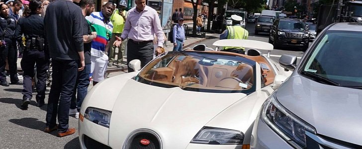 Tracy Morgan stands outside his Bugatti Veyron after Honda CR-V slammed into him