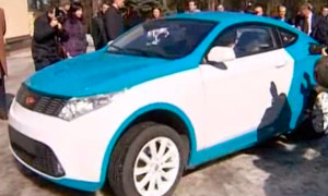 Vladimir Putin Tests First Russian Hybrid Car