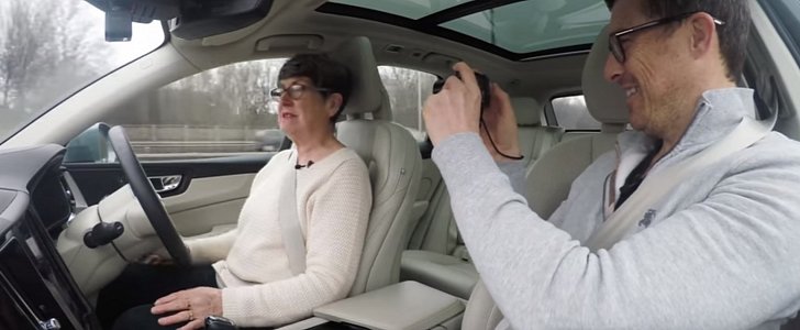 Elderly woman trying semi-autonomous system in a Volvo XC60