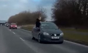 VW Golf Driver Caught Hanging Out the Window While Doing 50mph