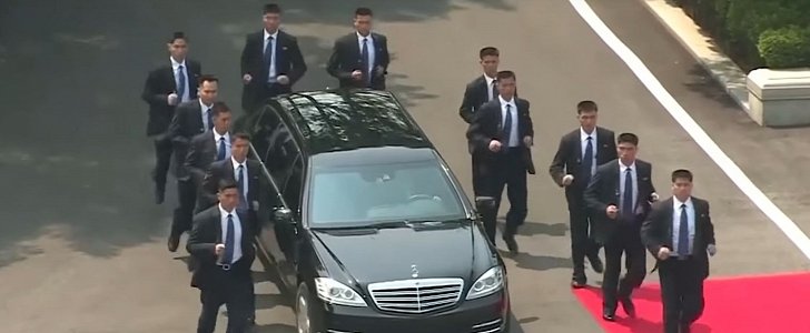 Watch 12 Bodyguards Run Alongside Kim Jong-un's Mercedes Limo
