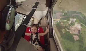 Watch a 4-Year-Old Girl Reacting to Her Father Flipping the Plane Upside Down <span>· Video</span>