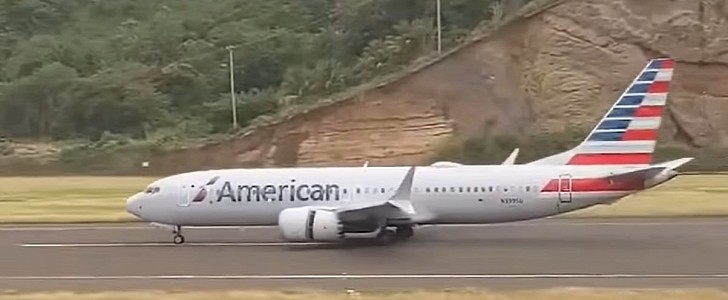 The plane was speeding on the runway to prepare for takeoff