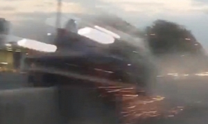 Watch a Car Hit the Median and Launch into the Air