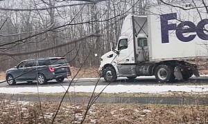 Watch a Ford Expedition Rescue FedEx 18-Wheeler Stuck on the Side of the Road