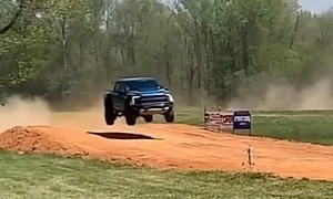 Watch a Ford F-150 Raptor Owner Breaking His Back With a Huge Jump