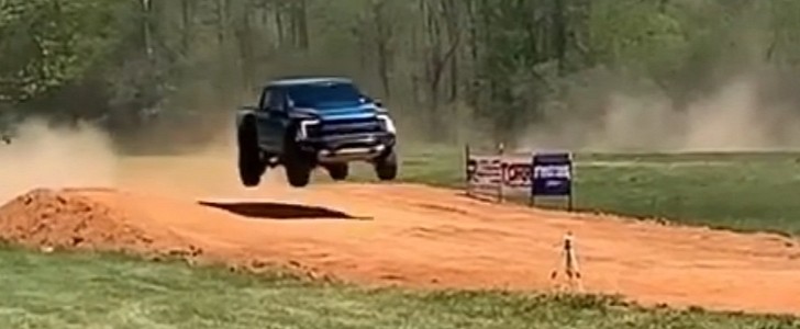Watch a Ford F-150 Raptor owner breaking his back with a huge jump