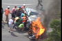 Watch a Group of Strangers Lift a BMW Off an Unconscious Rider