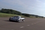 Watch a Koenigsegg Agera R Drag Race a Ford Focus with a Twist