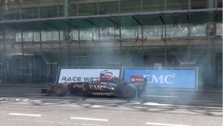 Lotus F1 car doing donuts in London