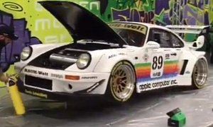 Watch a Porsche 911 with an On-Board Air Jack Jump Like a Frog