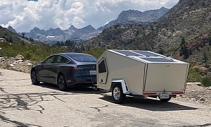 Watch a Tesla Model 3 Towing a Camper at 55 MPH, Passes the Test With Flying Colors