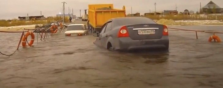 Truck sinks bridge in Russia