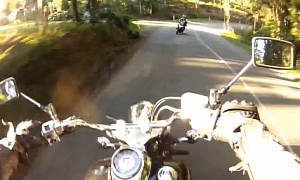 Watch and Learn: Stupid Rider Goes Wide, Hits the Camera Motorcycle