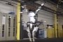 Watch Boston Dynamics Atlas Challenge Nadia Comaneci
