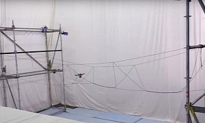Drones Building a Bridge Out of Ropes Look Like Robotic Spiders