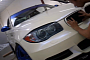 Watch How a BMW E82 135i Gets a Gloss Pearl White Wrap